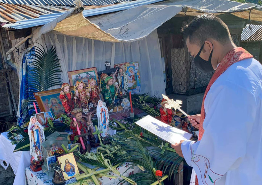 Father Velasquez offering his blessings