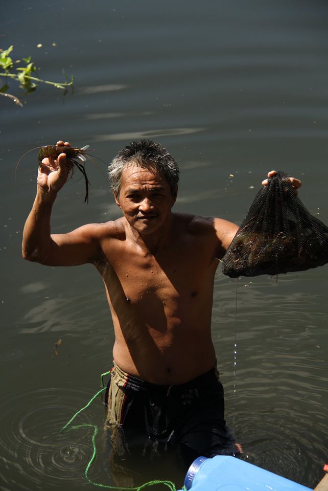a local fishing in pulilan
