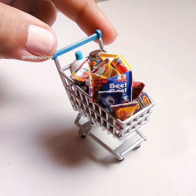 mini shopping cart filled with groceries