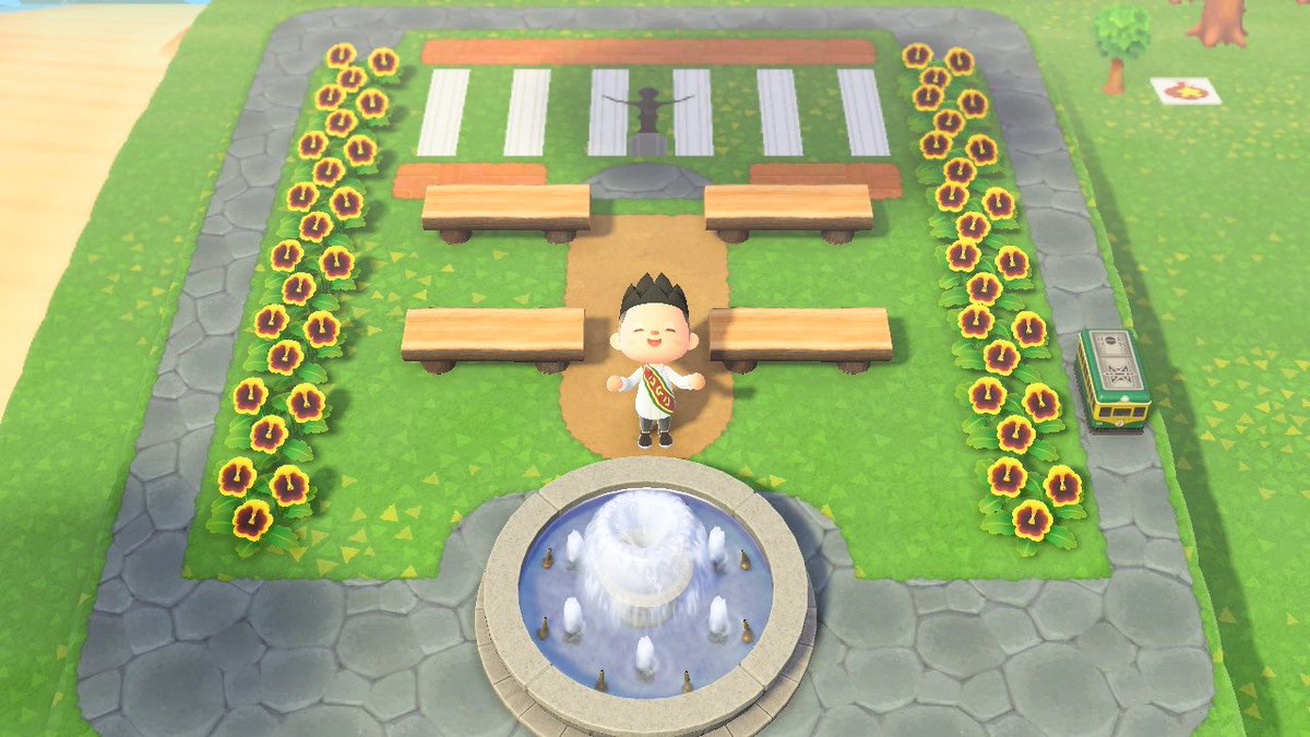 Animal Crossing replication of the UP Oval, with a UP student in graduation outfit