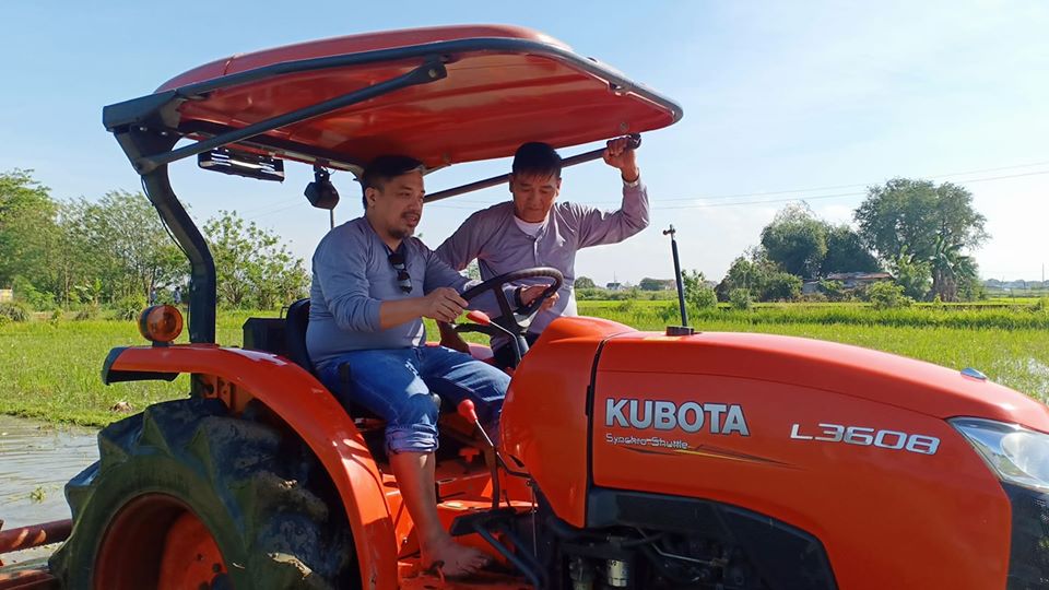men on a tractor in pulilan