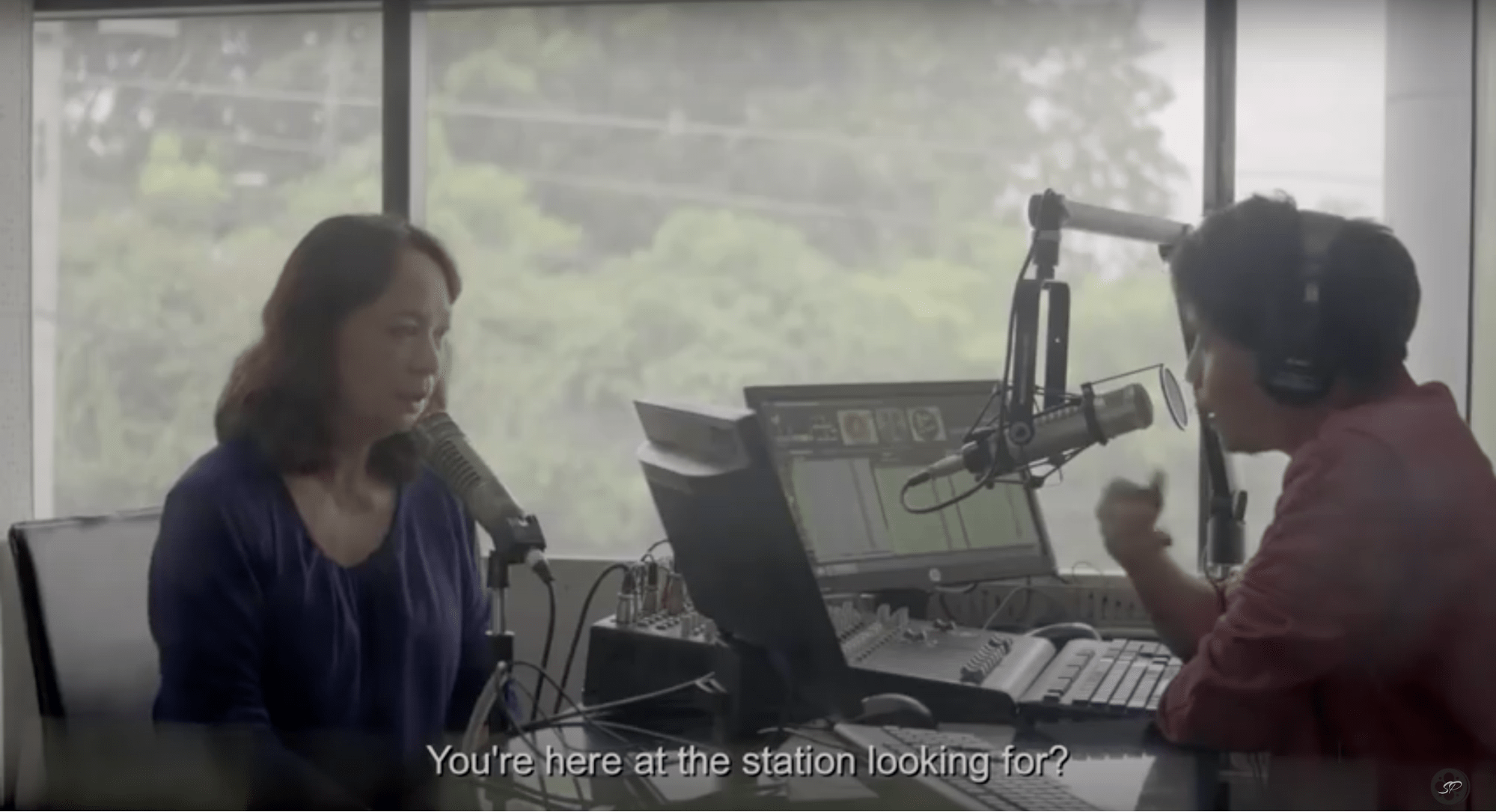 woman at a radio station