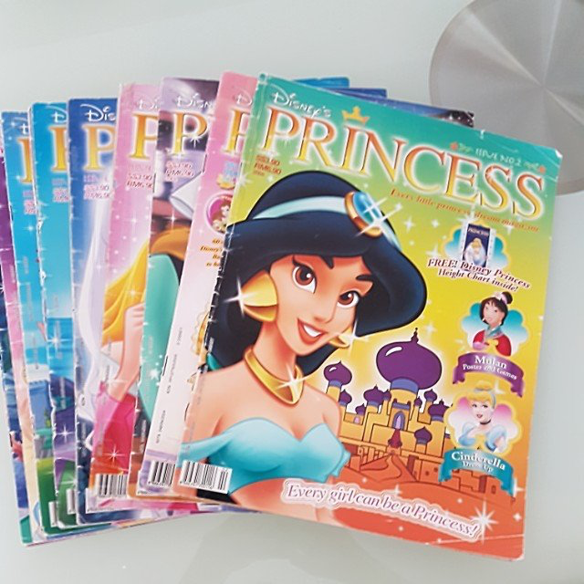 a pile of disney princess magazines
