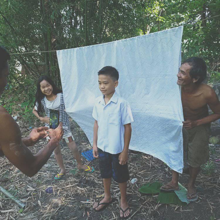 DIY photo studio - Family from Iloilo creates a photo studio using a white curtain