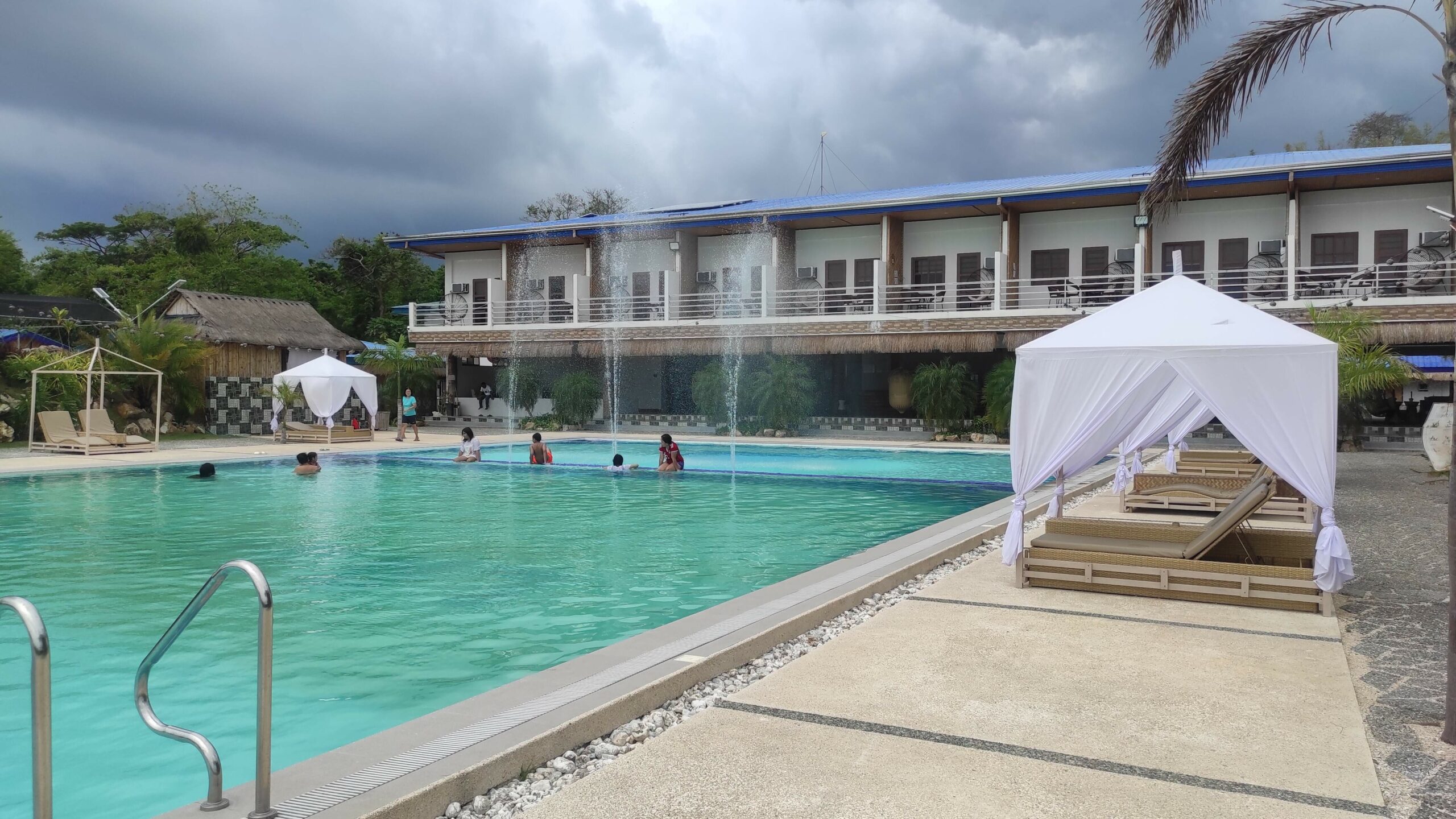 LaSersita Casitas and Waterspa in Mansalay - beachfront pool and rooms