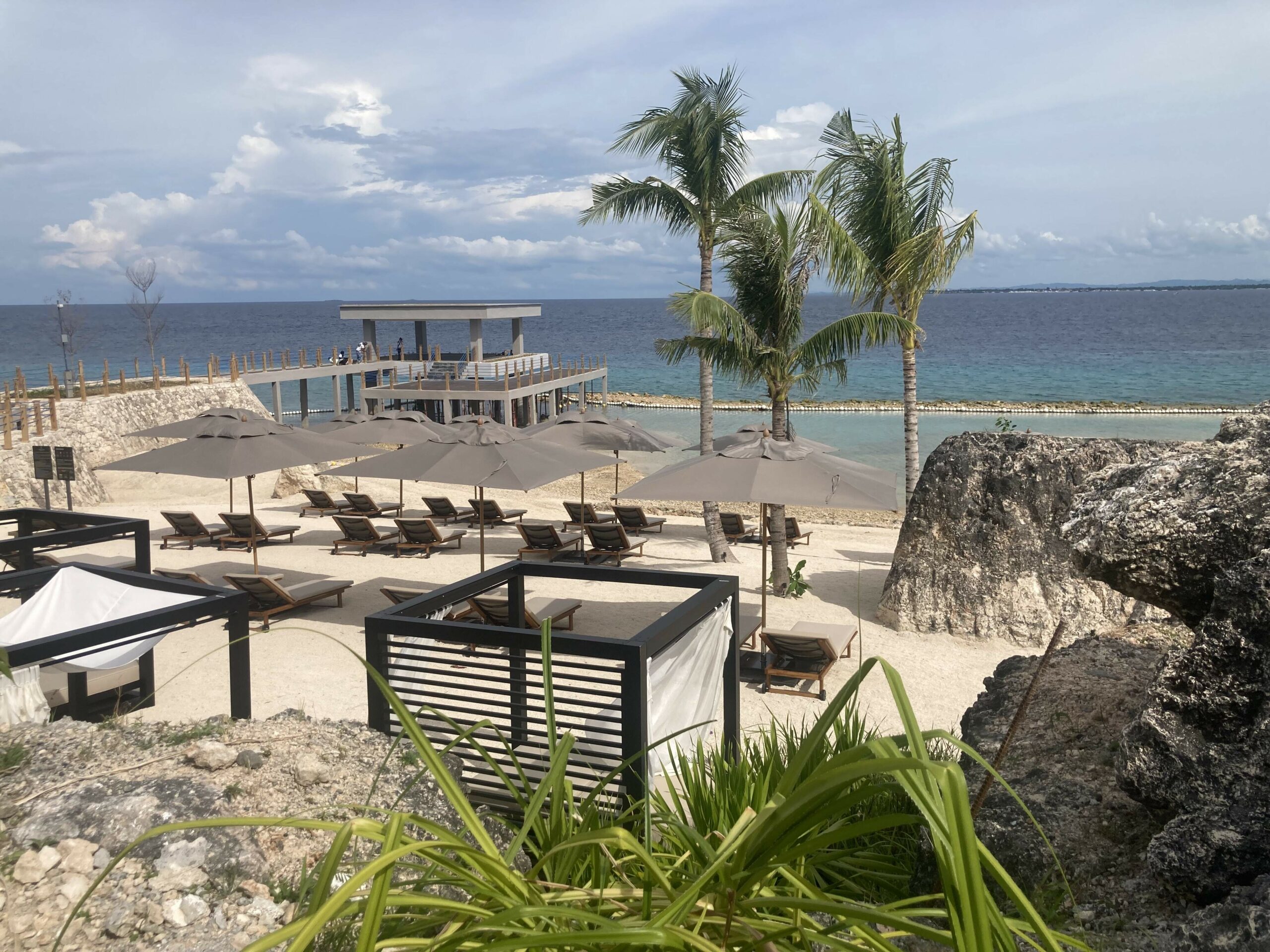 Sheraton Cebu Mactan Resort in Lapu-Lapu City - beachfront view and lounges