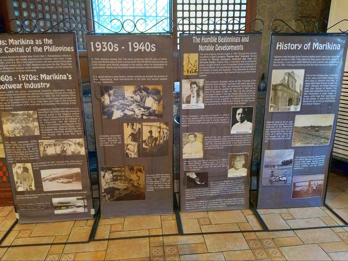 historical explanations on panels at the marikina shoe museum